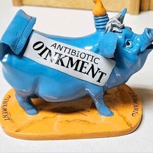 Collectible Pig Invasion Antibiotic Oinkment Blue Figurine 4x3x3.5"